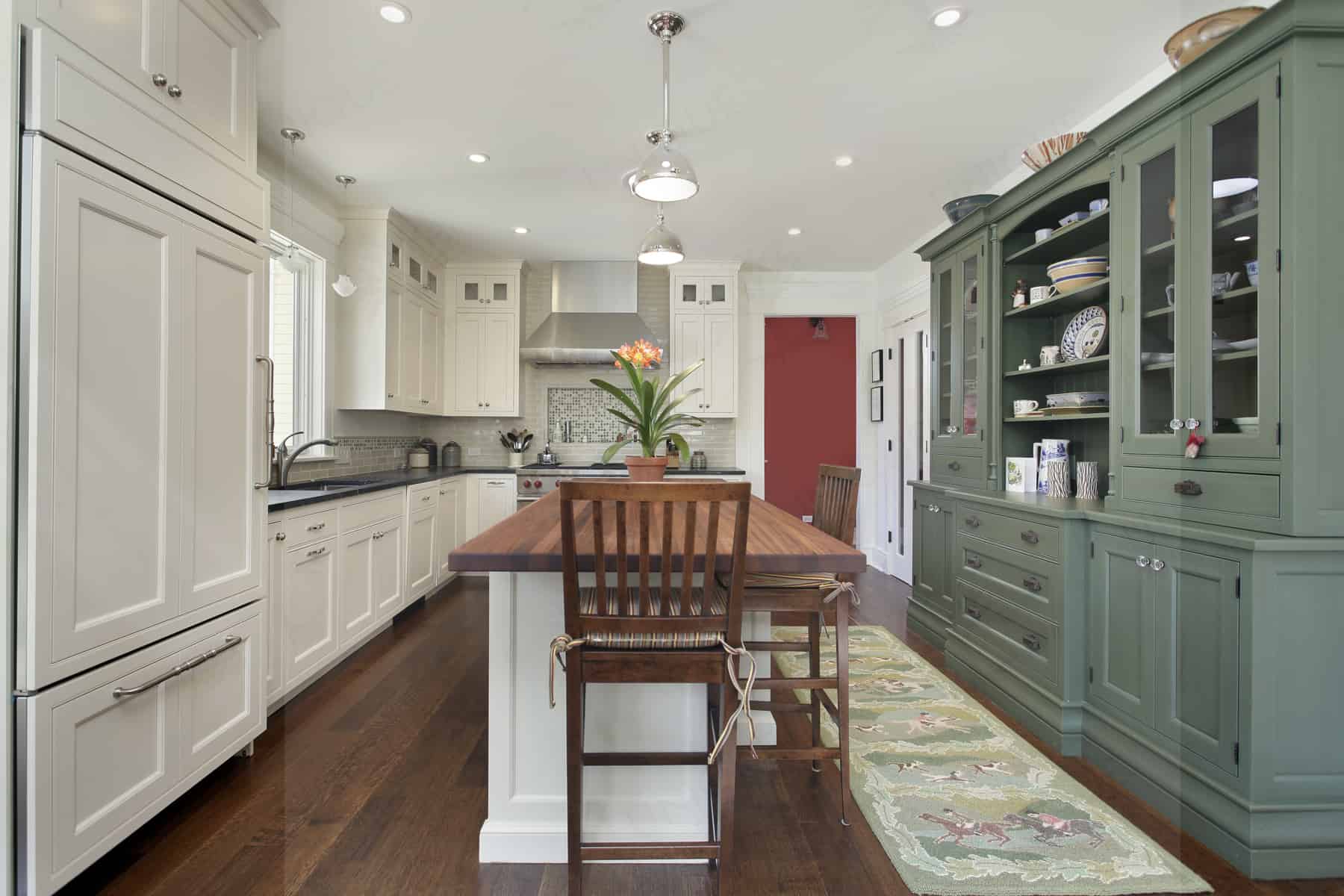 Kitchen in contemporary home with wood top island